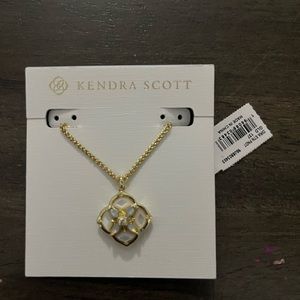 Kendra Scott Dira in gold .